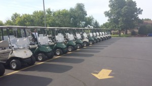 golf carts ready for golf tournament